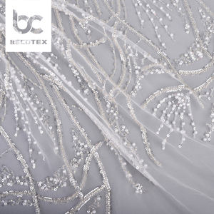<span class=keywords><strong>Pas</strong></span> <span class=keywords><strong>cher</strong></span> prix <span class=keywords><strong>de</strong></span> gros conception personnalisée blanc sequin perlé broderie 100% polyester tricoté dentelle tissu pour <span class=keywords><strong>robe</strong></span> - Product Image 1