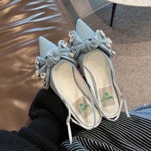 Nouvelles sandales plates pour femmes avec nœud papillon et cristaux, en tissu jean, sandales sans talon pour femmes et jeunes filles, chaussures plates, fabrication OEM - Product Image 4