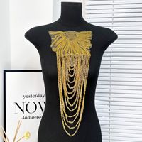 Accessoire d'épaule en dentelle pailletée avec chaîne de pompon 3D avec strass pour robe de mariée vêtements de cérémonie patch de broderie en or