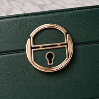 Dunkelgrüne Gesteppte Mehrstöckige Schmuckorganisationsbox mit Schubladen, Ringrollen und Goldfarbenen Beschlägen