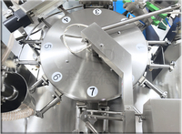 Machine de remplissage et de scellage entièrement automatique rotative à huit postes pour l'emballage de sachets stand-up, doypacks et pochettes à bec verseur
