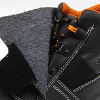Chaussures de sécurité pour soudeurs en acier OEM pour hommes, résistantes aux perforations, avec embout en acier, en cuir de vache noir, antidérapantes, résistantes à l'huile, semelle en PU