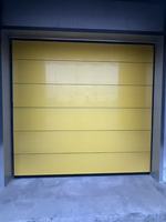 Porte sectionnelle industrielle à levage vertical robuste pour usine