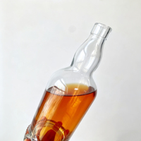 Bouteille en verre rond élégante de 700 ml et 750 ml à prix compétitif pour whisky, vodka, tequila, rhum et spiritueux avec bouchon en liège