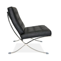 Fauteuil lounge moderne en cuir avec repose-pieds, célèbre et tendance