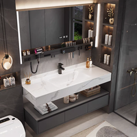 Ensemble de coiffeuse moderne gris clair avec lavabo en céramique mural et miroir à LED pour usage hôtelier