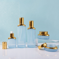 Ensemble cosmétique en verre personnalisé de luxe de haute qualité, pot de 30 g/50 g, flacon cylindrique de 40/100/120 ml, bouchon à vis sérigraphié pour les soins de la peau