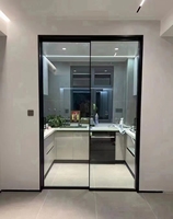Porte pliante panoramique minimaliste en aluminium noir avec moustiquaire invisible, porte intérieure en verre pour patio, appartement et véranda