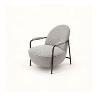 Fauteuil lounge moderne en tissu gris, fauteuil d'appoint rembourré avec cadre en métal noir, fauteuil de lecture à dossier bas pour salon