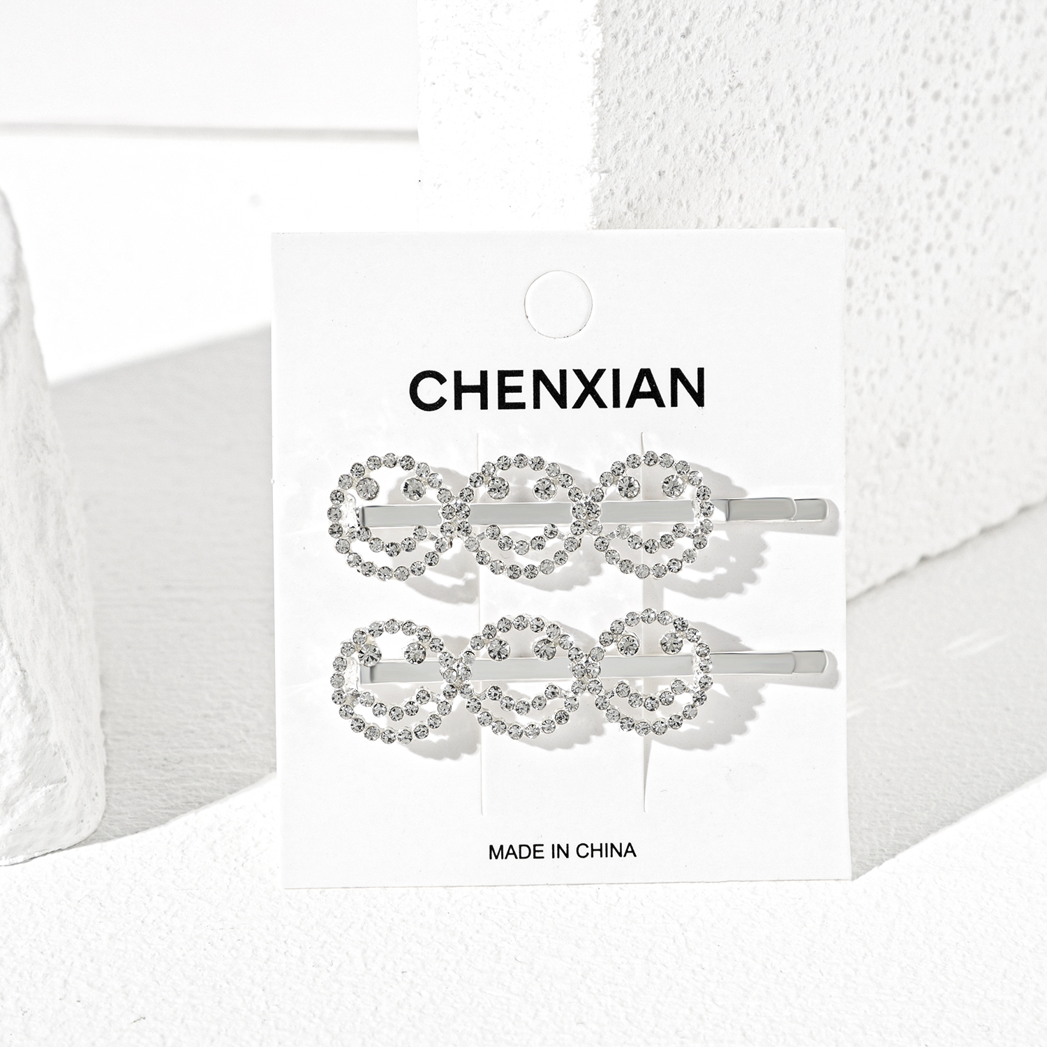 Silver smiley face rhinestone hair clip