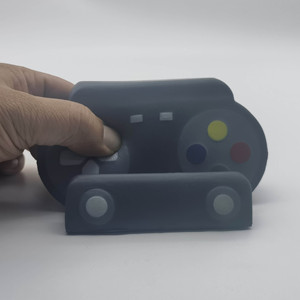 Support de téléphone en mousse PU anti-stress en gros, design manette de jeu fantaisie pour enfants de 5 à 7 ans, unisexe - Product Image 2