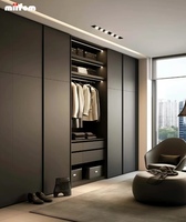 Sistem Lemari Pakaian Built-in Modern Tanpa Gagang, Warna Gelap Matte, Dilengkapi Lampu LED, Laci Penyimpanan, dan Kabinet Kamar Tidur Custom