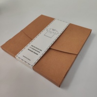 Nouvelle boîte d'emballage pliante en papier kraft personnalisée Pulida 2025, vente en gros, pelliculage brillant, gaufrage pour T-shirts, vêtements, boîte cadeau