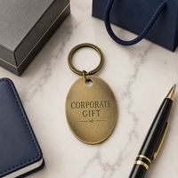Porte-clés personnalisé en métal avec finition laiton antique, logo en relief, ovale vintage en alliage de zinc, porte-clés commémoratif pour cadeau souvenir