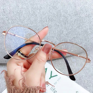 Nuevas <span class=keywords><strong>gafas</strong></span> antiazules Venta al por mayor Moda Metal Fame Retro Redondo Unisex Ojo Espejo de luz plana - Product Image 1