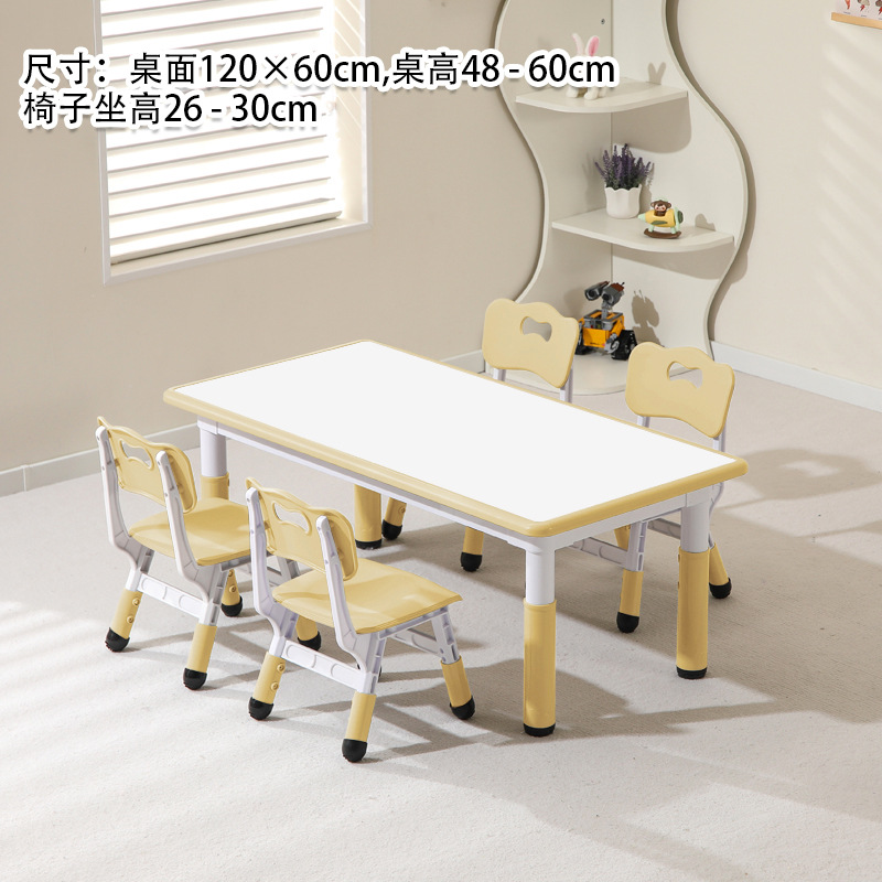 Whiteboard, yellow table, four chairs