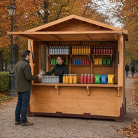 Kiosque pliant en bois pour stand alimentaire de Noël, utilisation événementielle ou en marché.
