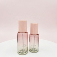 Flacon cylindrique en PETG pour huile essentielle, pompe sans air pour soin de la peau, sérum, crème pour le visage, lotion, démaquillant, logo personnalisé