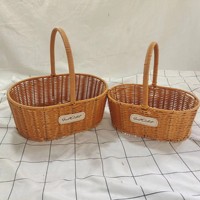 Panier en rotin PE fabriqué en usine pour cadeau ou décoration florale de la maison avec cadre en métal, imperméable, lot de 2