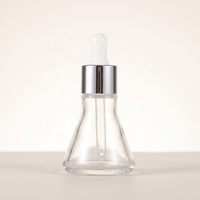 Flacon compte-gouttes en verre cylindrique transparent 30 ml avec bouchon à vis, col en PP, estampage doré, pour huiles essentielles, sérums, crèmes visage et diffuseurs