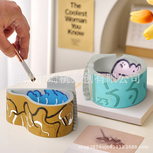 Portalápices creativo de resina con diseño de grafiti, forma redonda, para decoración de escritorio y regalo - Product Image 1