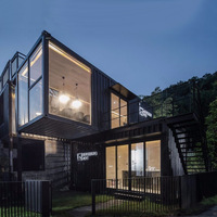 Maison conteneur préfabriquée soudée sur mesure, moderne, à deux étages, modulaire, avec grande fenêtre vitrée, anti-corrosion, à assemblage rapide pour villa