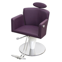 Chaise de barbier noire élégante vintage haut de gamme avec accessoires de quincaillerie uniques pour salon de coiffure