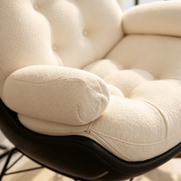 Fauteuil à bascule Egg Shell au design moderne, chaise longue en PU noir, tissu capitonné crème, support métallique double triangle