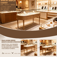Comptoir de présentation de bijoux ovale, vitrine à bijoux en verre avec éclairage LED et tiroirs de rangement, mobilier sur mesure pour magasin de bijoux de luxe