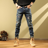 Nouveau pantalon décontracté en jean pour homme 2024, coupe droite, imprimé graffiti artistique, style streetwear, effet usé urbain, collection automne