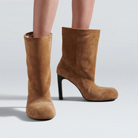 Bottines à bout rond sculpturales en cuir véritable à talon aiguille haut, style minimaliste, pour femmes, vente en gros OEM ODM