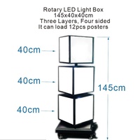 Support de panneau publicitaire rotatif à LED sur pied ADE, 3 couches, 4 faces, 40x40x40cm, en métal noir, 12V DC