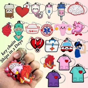 Adorables llaveros con temática médica, llaveros de PVC con diseño de gorro de enfermera, cerebro, corazón y órganos en varios estilos, regalos ideales para enfermeras y paramédicos. - Product Image 1