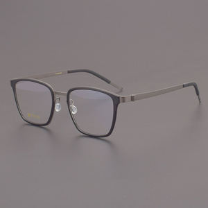 Gafas de titanio 9749, montura de gafas ultraligera de alta calidad, Forma de cara de diamante, sin tornillos, a juego para hombres con miopía - Product Image 1
