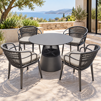 Table de salle à manger ronde moderne d'extérieur avec piétement en métal et design en corde tressée pour patio, jardin, café, restaurant, hôtel, terrasse
