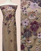 Tissu en dentelle à perles bleues pour robe, motif floral