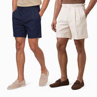 Shorts ajustés en coton extensible pour hommes, à double pli, avec fermeture boutonnée, ajusteurs latéraux, sans ceinture, style décontracté chic, vente en gros