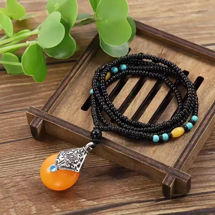 Gioielli etnici alla moda perle di pietra artificiale cera d'api ciondolo collana buddista tibetana Bodhi perline Mala benedica collana