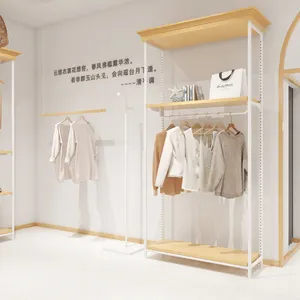 Luxury Clothing Store Fixtures Mall Metal Gold Wall Floor Stand Custom Clothes Display Rack