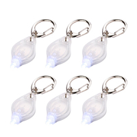 Vente en gros de cadeaux promotionnels LED porte-clés lumière violette UV personnalisés lampe de poche logo en gel porte-clés lumière flash
