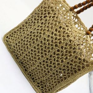 Bolso de playa de malla de ganchillo hueco para mujer, novedad de verano 2025, con asa de cuentas de madera - Product Image 4