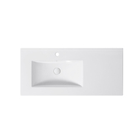Ensemble sanitaire rectangulaire moderne avec lavabo en céramique élégant et design de comptoir pour salles de bain d'hôtel, facile à nettoyer