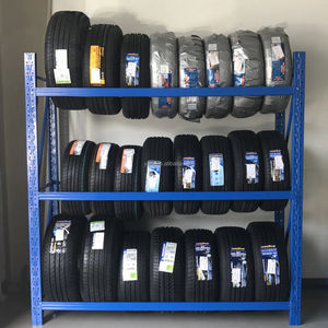 חנות אולם תצוגה מותאם אישית חלקי רכב גלגל סגסוגת אוטומטי צמיג מתכת מעמד תצוגת מתלה אחסון צמיגים - Product Image 1