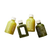 Bouteilles de boisson en plastique portables de qualité alimentaire, personnalisées avec un logo minimaliste, pour les boutiques de jus pressés à froid