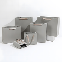 Custom Luxury Eco-Friendly Recyclable Paperboard Gift Boxes for Clothing & Shoes with Flexiloop Handle and Custom Logo