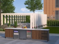 Cuisine extérieure avec évier et cuisinière, station de nettoyage avec bac à lavage profond, plaque de cuisson couverte et robinet escamotable