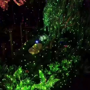 Firefly Effect Laser Projector for Dense Twinkling <b>Light</b> Points Across <b>Trees</b> Walls and <b>Outdoor</b> Surfaces - Product Image 1