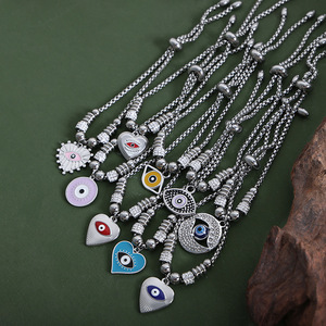 Fenny 18K PVD plateado venta al por mayor impermeable Retro personalidad colorido ojo colgante pulsera de acero inoxidable para mujeres - Product Image 5