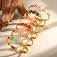 Gelang Bangle Fashion Wanita Trendy Lapis Emas 18K Bahan Stainless Steel Motif Bunga Terbuka