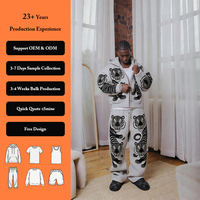 Ensemble survêtement streetwear personnalisé avec logo brodé, pantalon de jogging et sweat à capuche coupe ample avec impression en relief